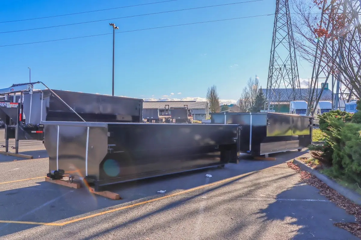 Roll-off dumpster ready for waste disposal at job site for 3 Yard Dumpster Rental in Ocean Shores